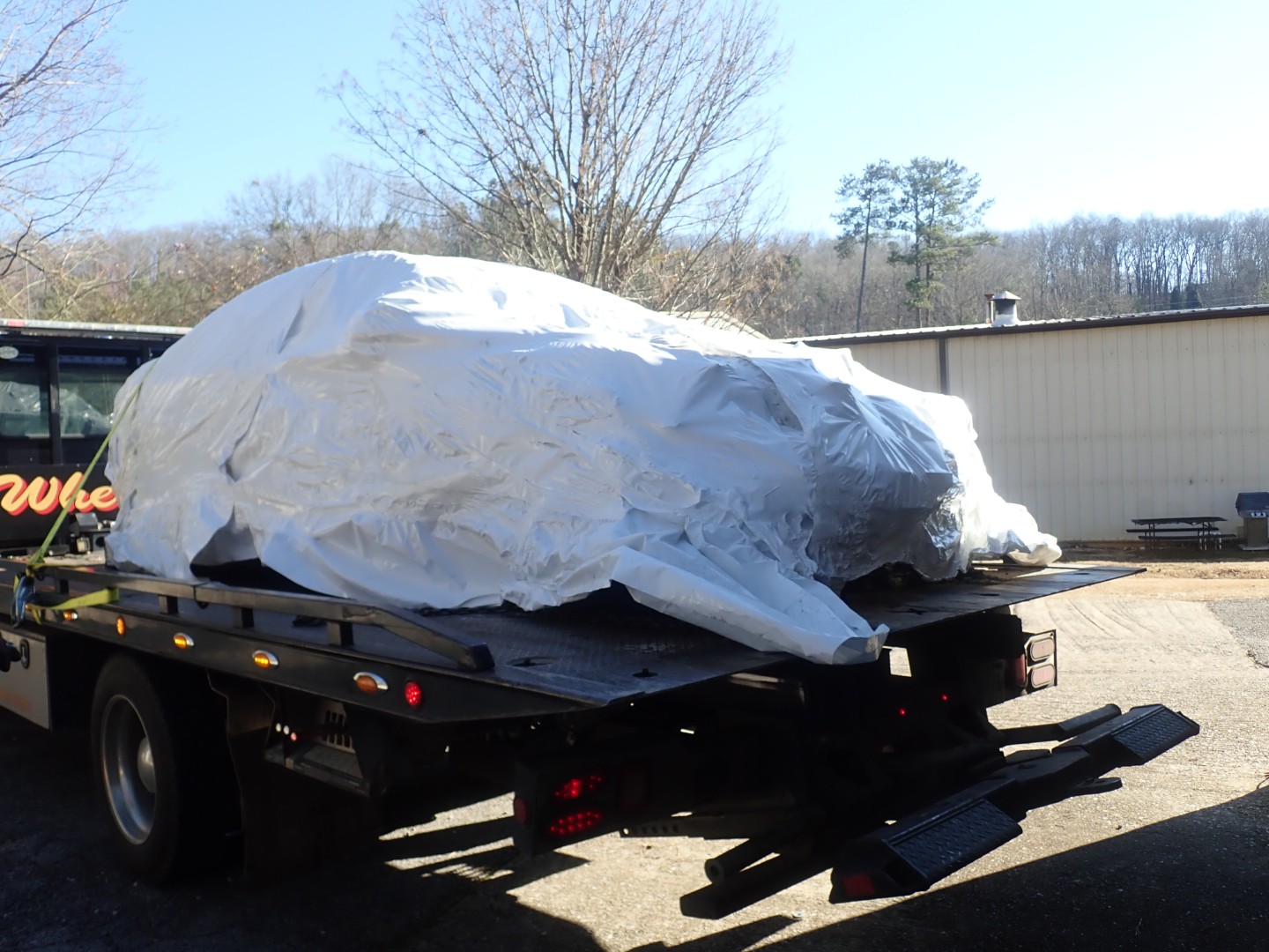 Wrapped vehicle dropped off